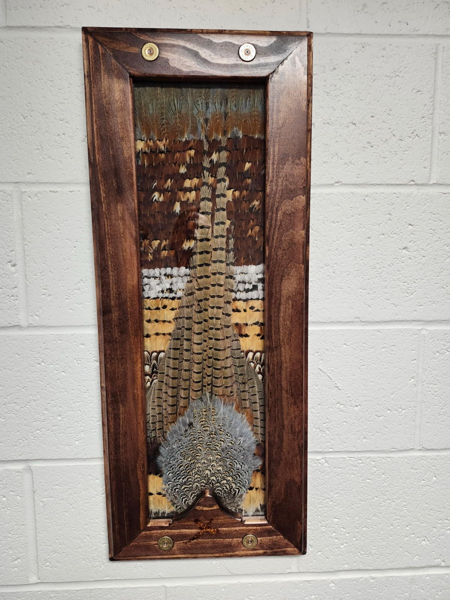 Student-built Pheasant piece in a tall walnut frame with corner medallions